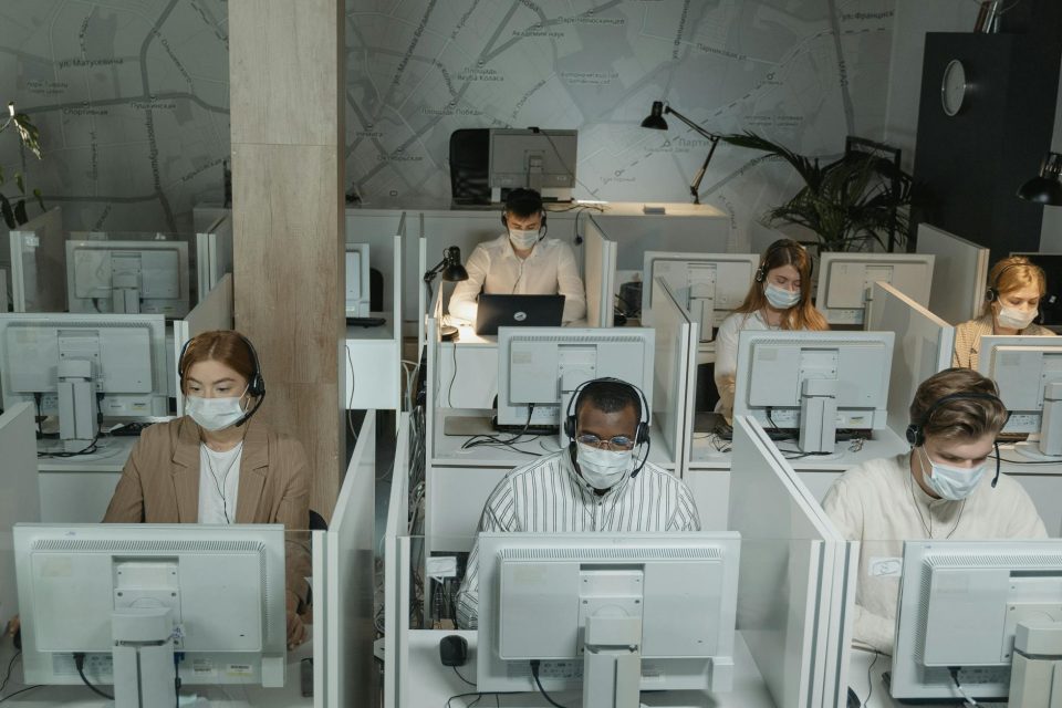 people working on a call center