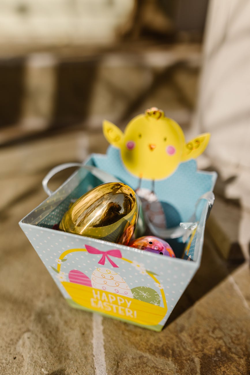 gold and silver baubles in box