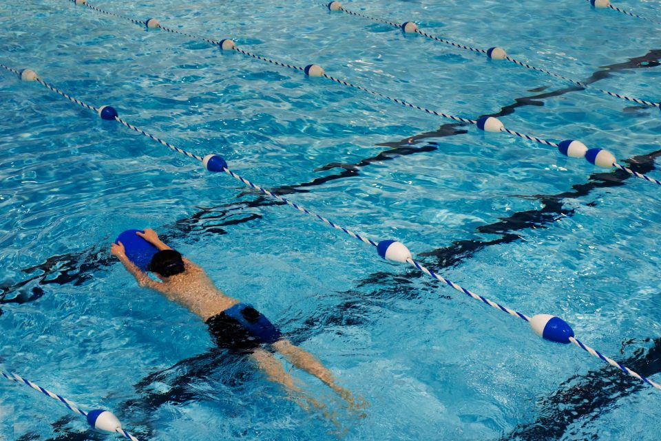 photo of boy in swimming pool