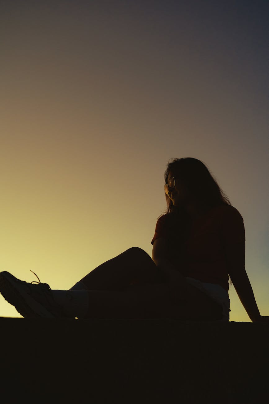 silhouette of woman at sunset in vietnam