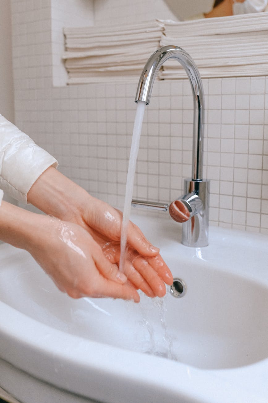 person washing hands