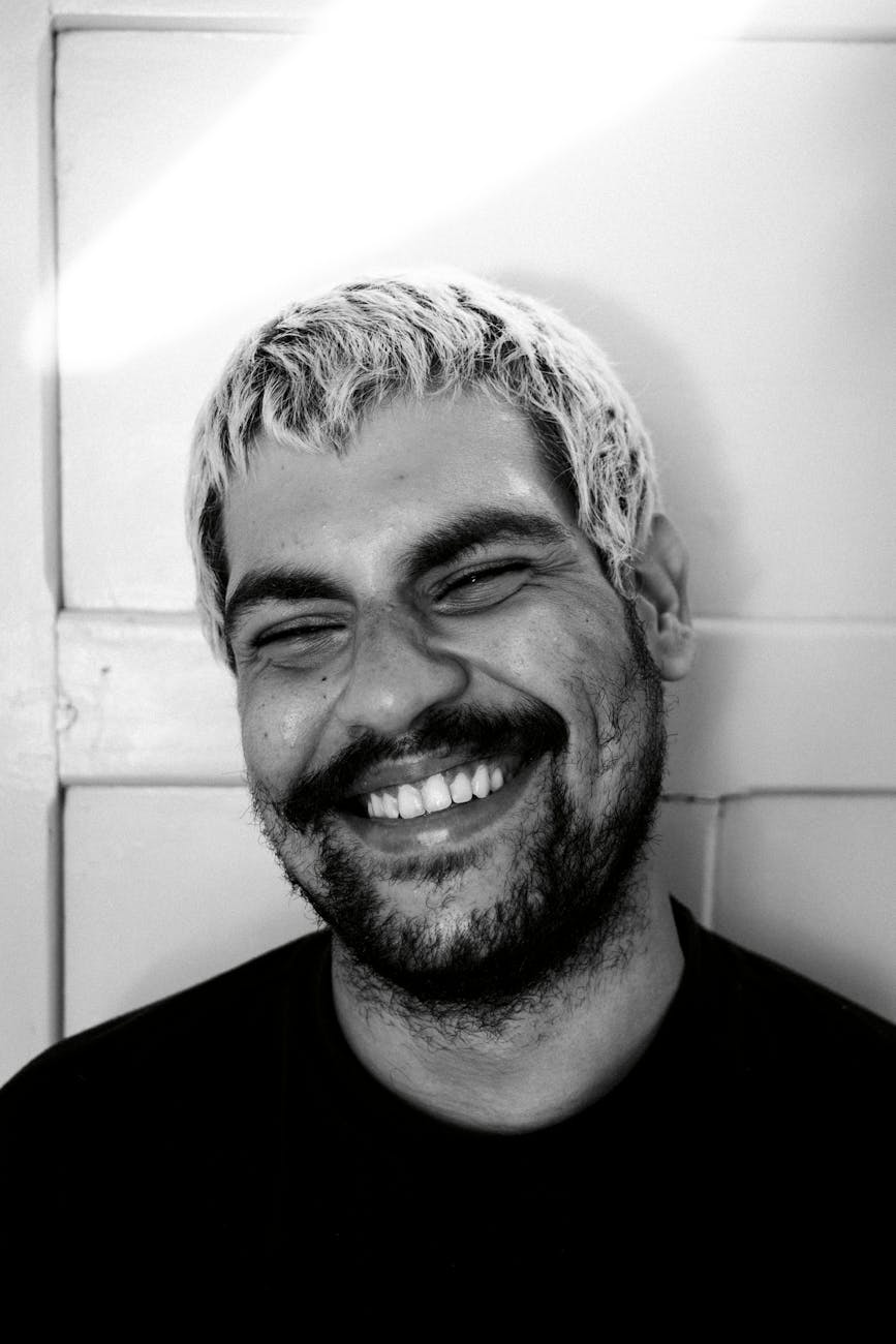 black and white portrait of smiling man