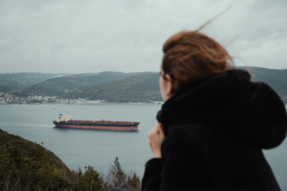 woman looking at a ship