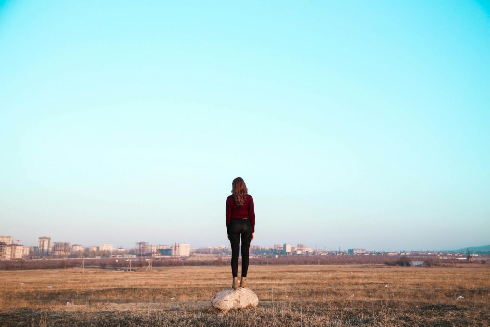 woman under blue sky