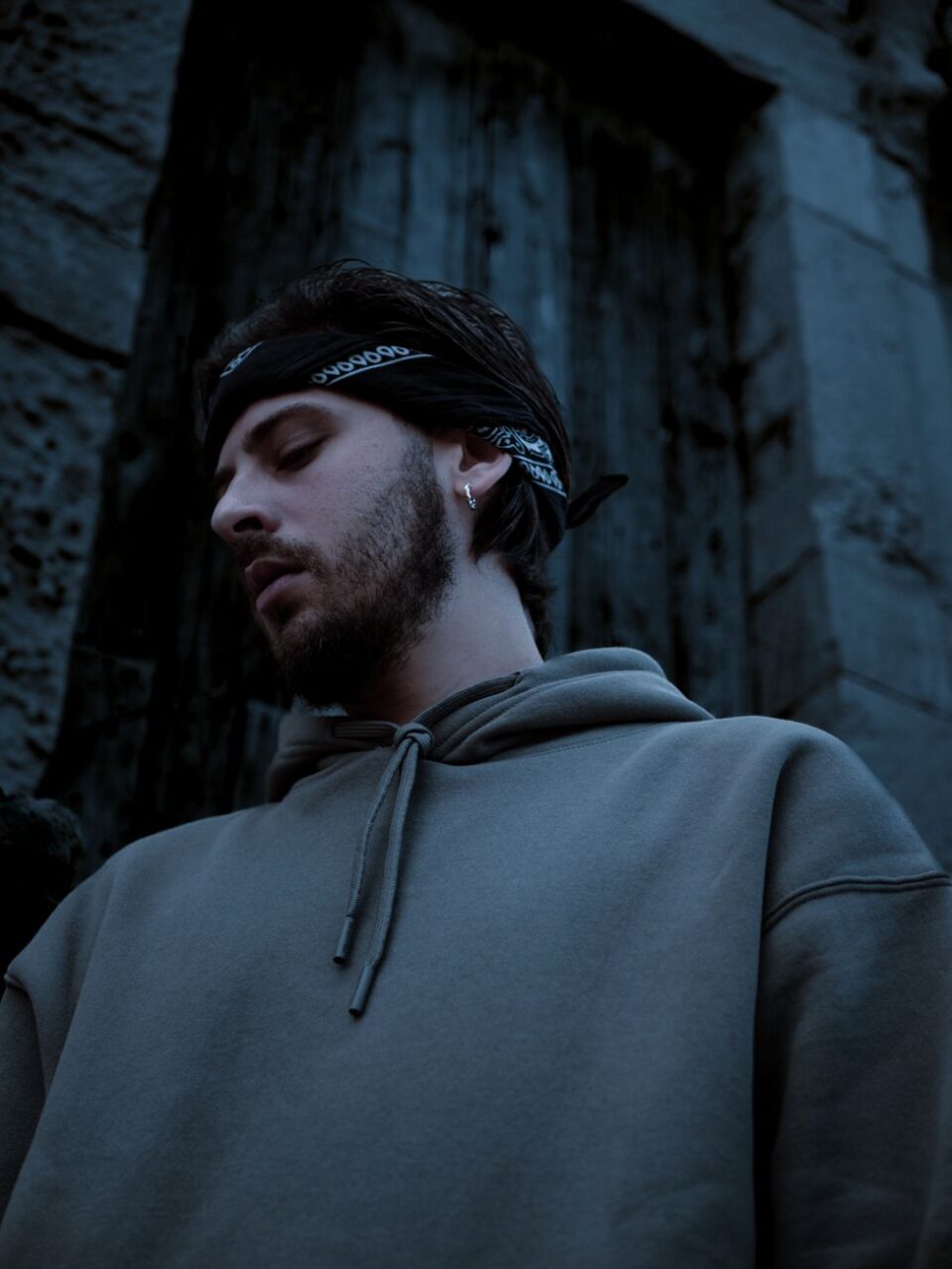 a man with a bandana on his head