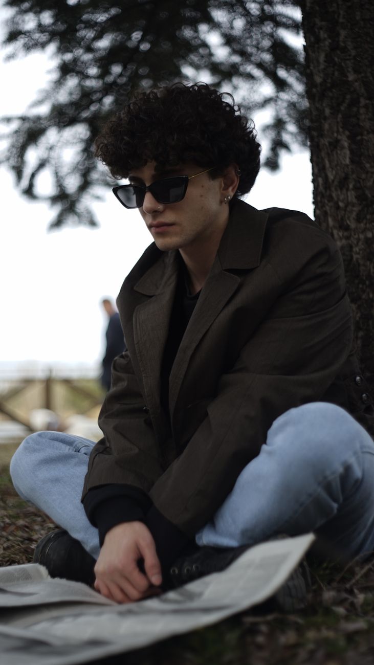 a person sitting on the ground