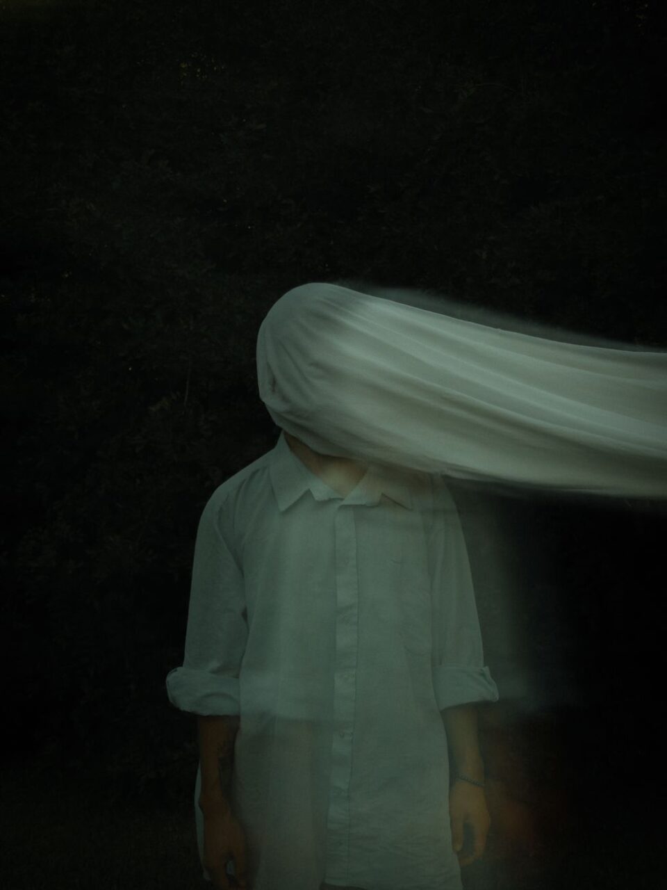 ethereal figure in mysterious motion blur